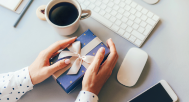 Someone holding a gift